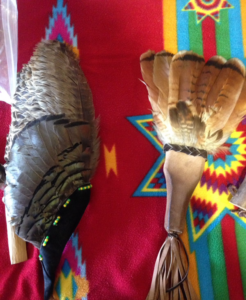 Fans serve several purposes in the Native culture. For example, it can be used in dances or as a shield from the sun. They are usually made of feathers and animal hide. 