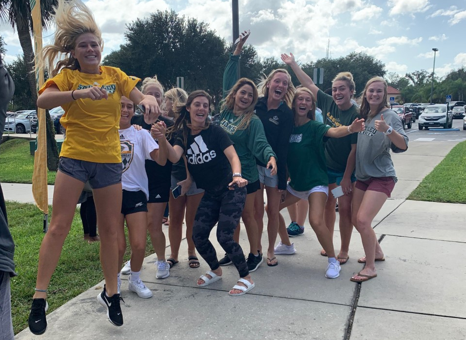 Members of the Women’s Lacrosse team celebrating