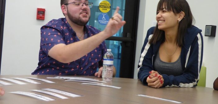 Students interacting in a table