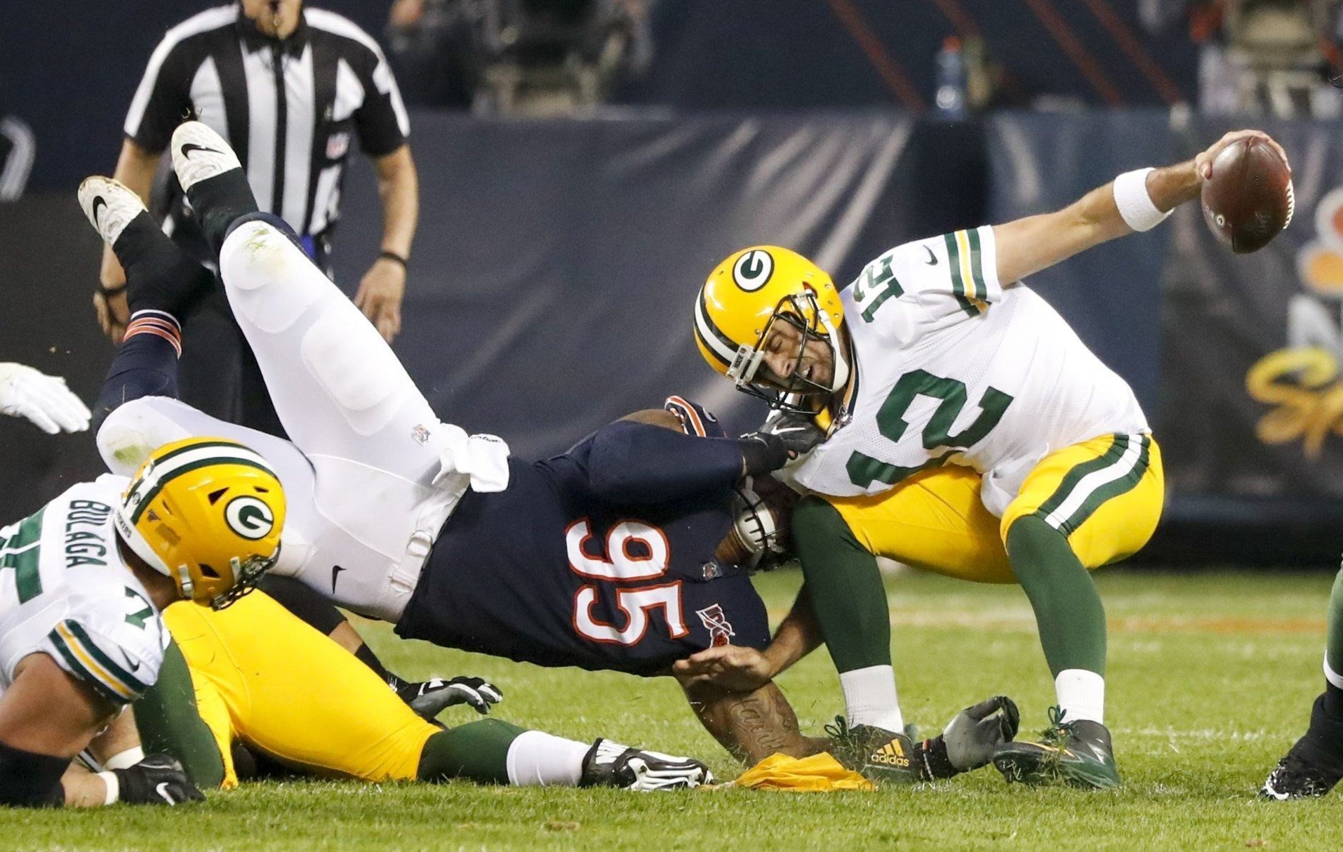 Bears’ Roy Robertson-Harris sacks quarterback Aaron Rodgers during the first half of the first NFL game of the year.