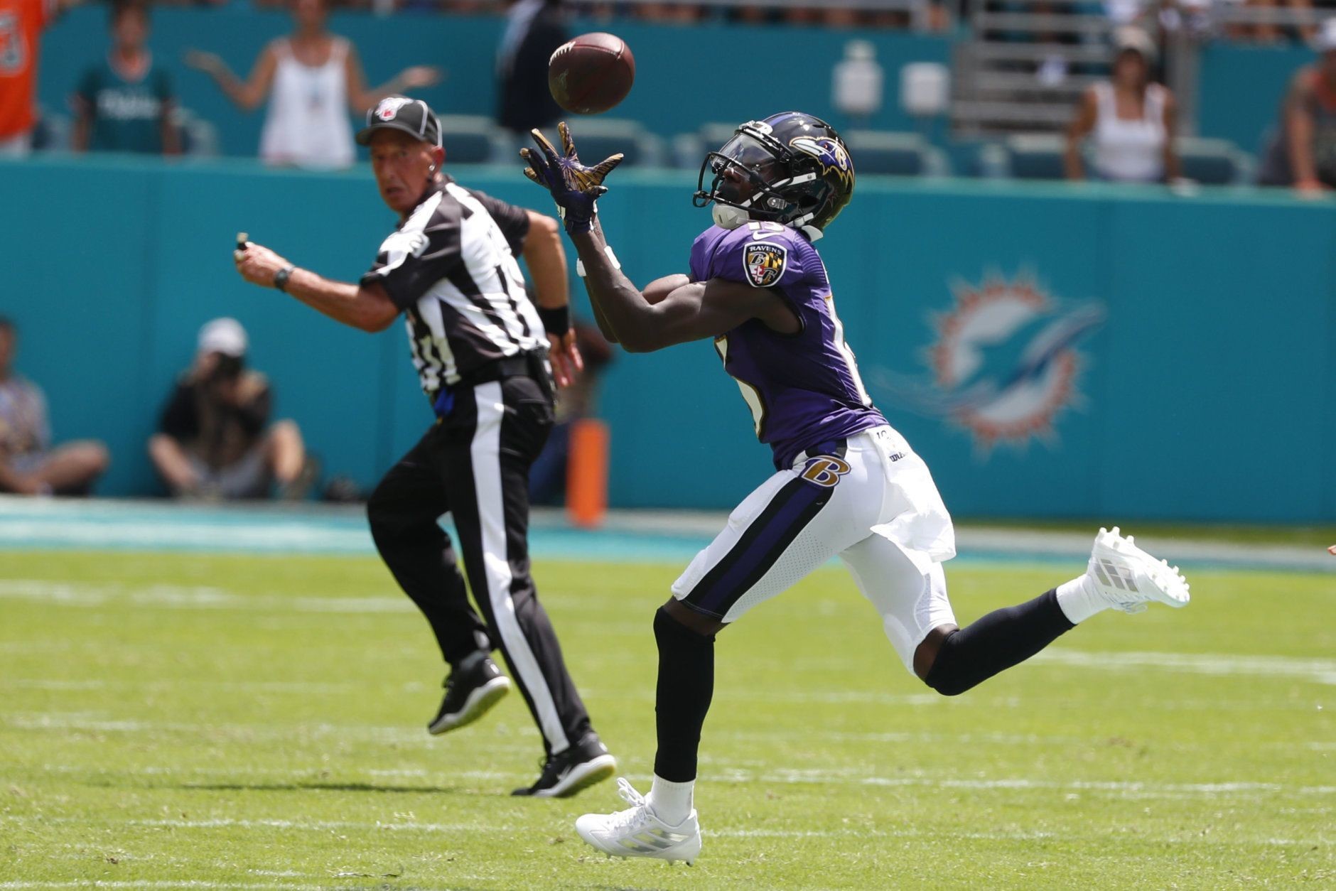 Ravens wide receiver Marquise Brown grabs a pass for a touchdown.