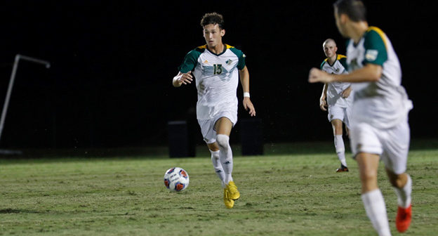 Saint Leo University men's soccer player controlling the ball