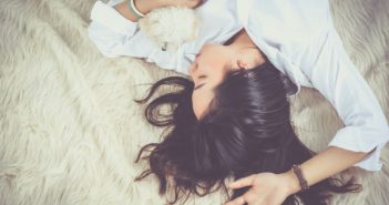 Brunette girl sleeping.