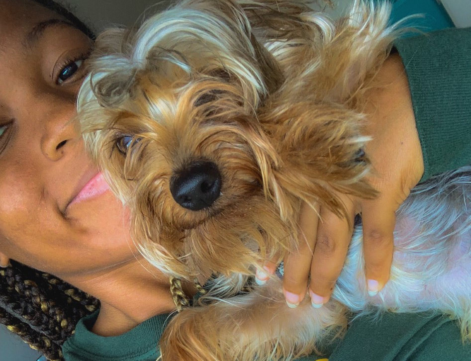 Saint Leo University student Samiah Rutherford and enjoying her time with her dog Rico.