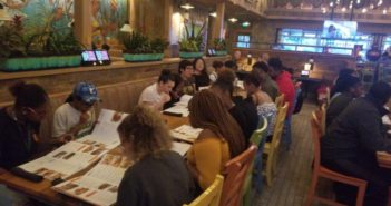 Saint Leo University students eating at Texas Roadhouse.