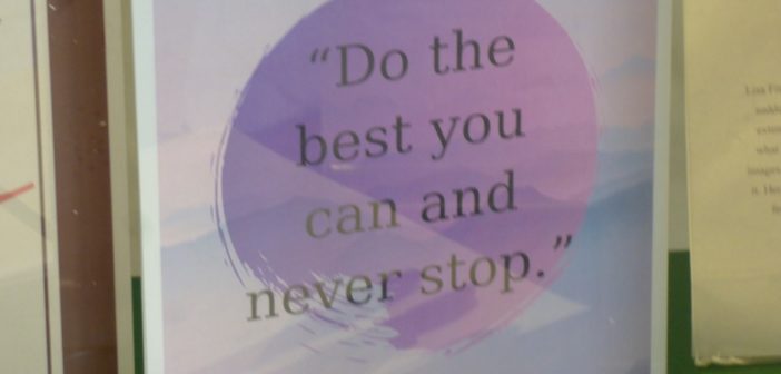 Quote on a board saying, Do the best you can and never stop