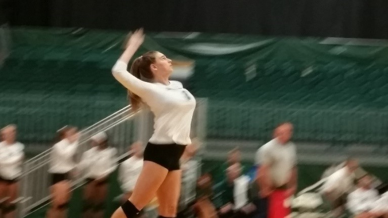 Saint Leo Volleyball Player Leaping into Action 