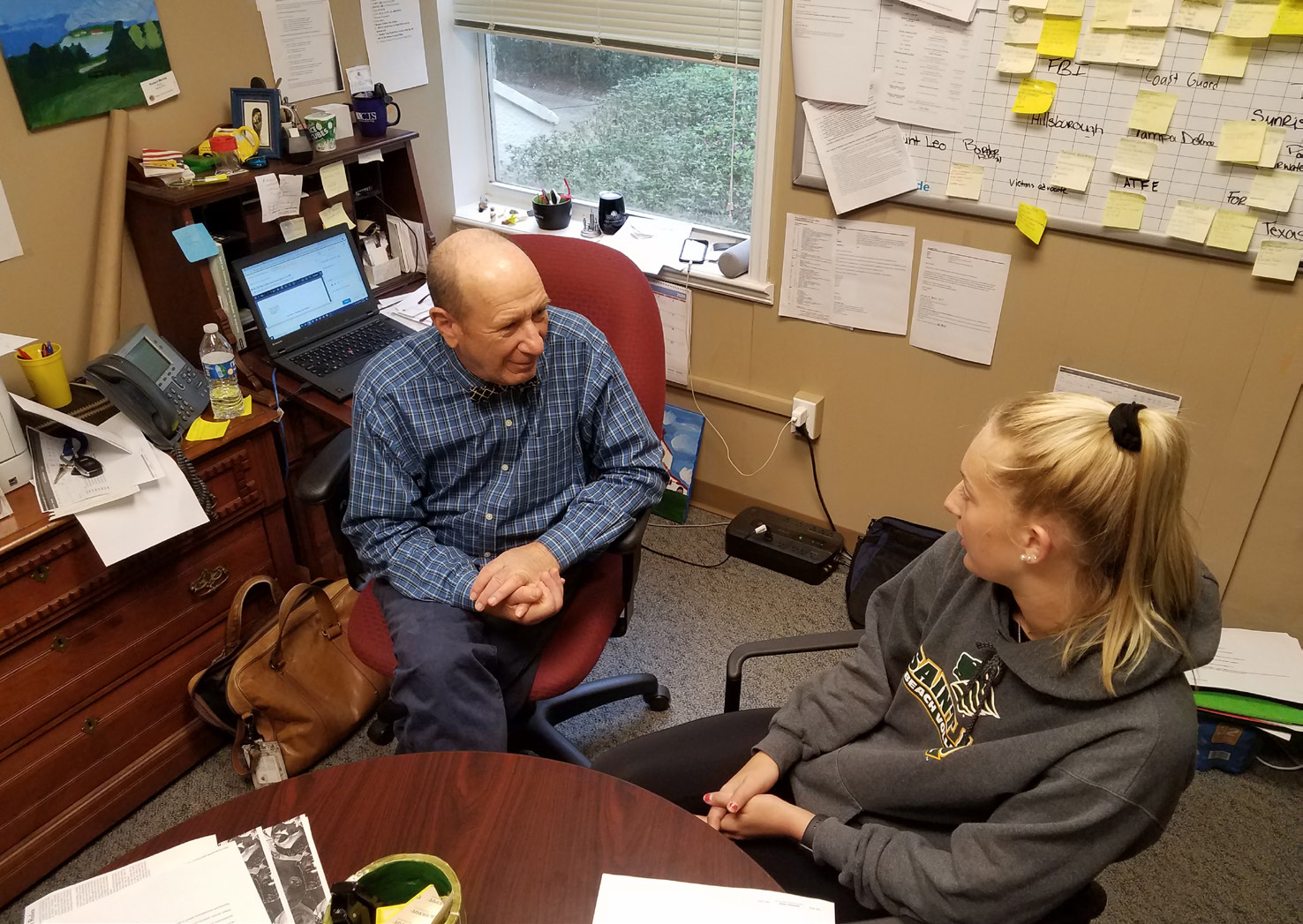  The hustle and bustle of Dr. Cillo's office is what keeps the Criminal Justice program growing. Each day a revolving door of students are consulting with him about internship opportunities or simply chatting. 