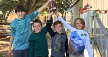 Cut Line: Our sports team, Gabriel (far left), Brady (center left), Tyler (center right), and Blaine (far right), are all big football fans, so getting to write about the NFL elated them.