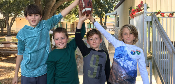 Cut Line: Our sports team, Gabriel (far left), Brady (center left), Tyler (center right), and Blaine (far right), are all big football fans, so getting to write about the NFL elated them.