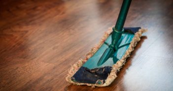 a mop mopping the wooden floor