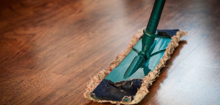 a mop mopping the wooden floor