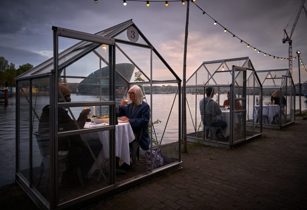 In Amsterdam, some restaurants have installed small greenhouses that each hold a two-person table to ensure social distancing, and that’s just beautiful.