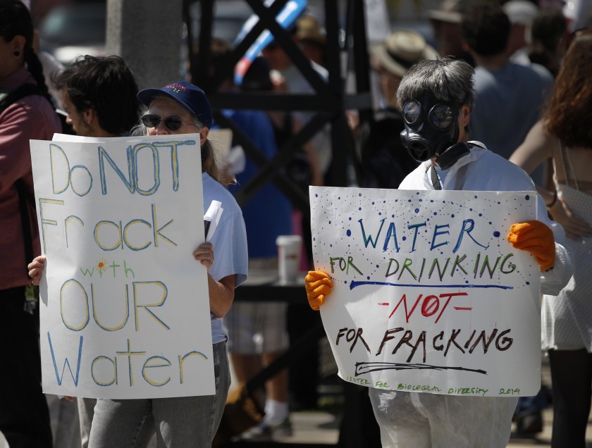 A group called Californians Against Fracking protests outside a state-run aquifer exemption workshop in 2015. The workshop was aimed to help oil companies get federal permission to dump waste fluid into California’s underground water.