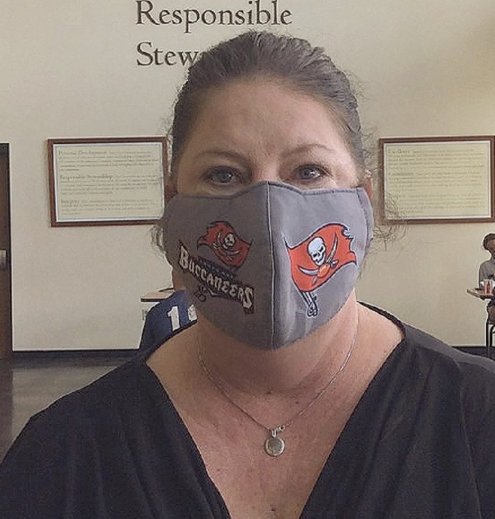 Virginia (Robin) Lavalle, dining service manager, wears her mask to support her team. (Photo Credit: Saint Leo University Instagram @saintleouniv)