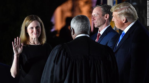 Amy Coney Barrett with other government officials