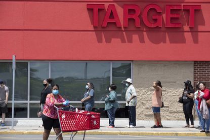 Target shoppers waiting in line outside store