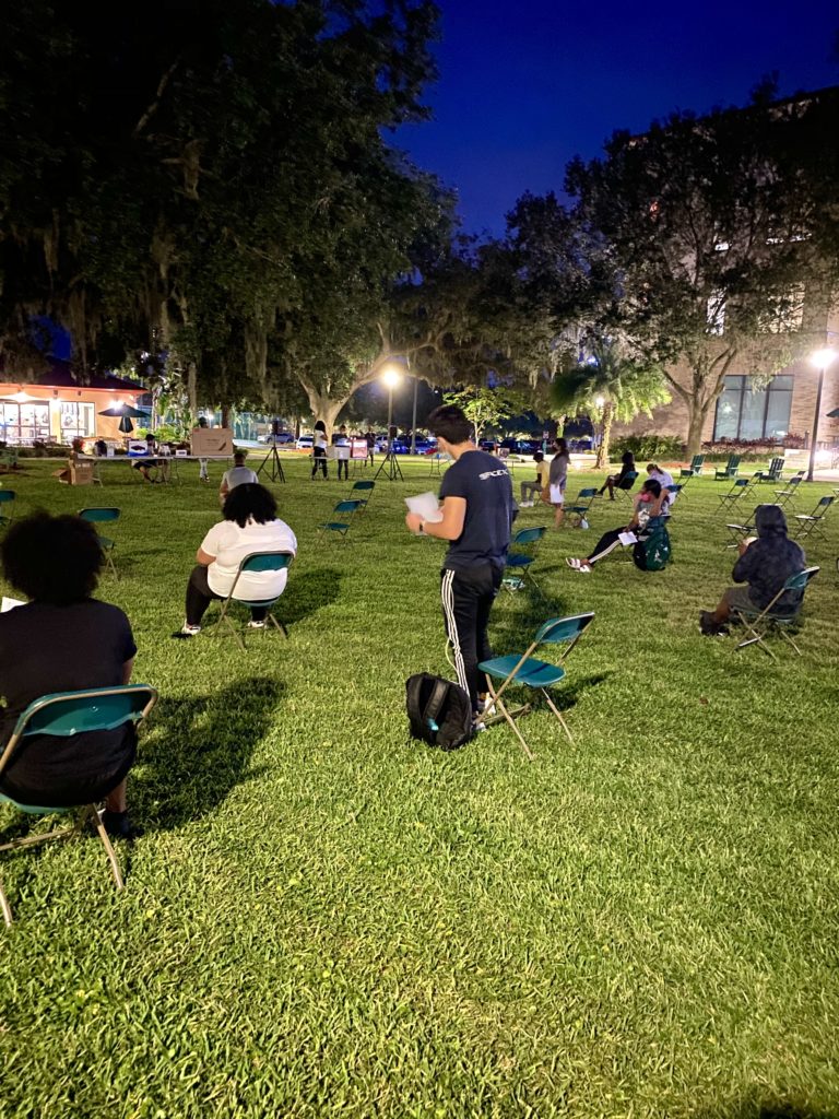 Students playing bingo outside