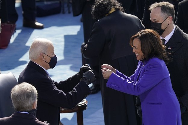 Joe Biden and Kamala Harris fist bump.