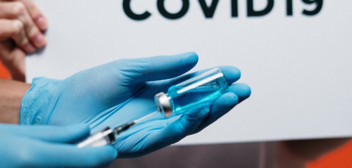 Covid vaccine in the medical hands