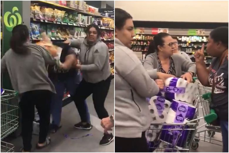 Women fighting over items inside a store