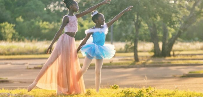 Two girls dancing